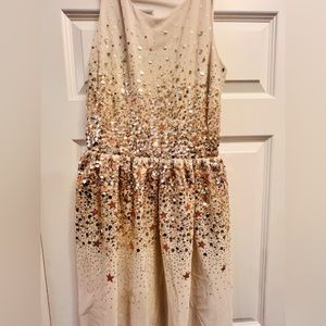 A young girls (13-14 years youth) H&M dress. Worn once. In very well condition.
